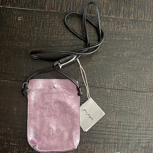 Free People Crossbody style, metallic leather fabrication, pouch design. - Picture 8 of 8